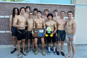 Photo courtesy Sara Carroll The boys swim team celebrate winning the 3A Southern Regional champ ...