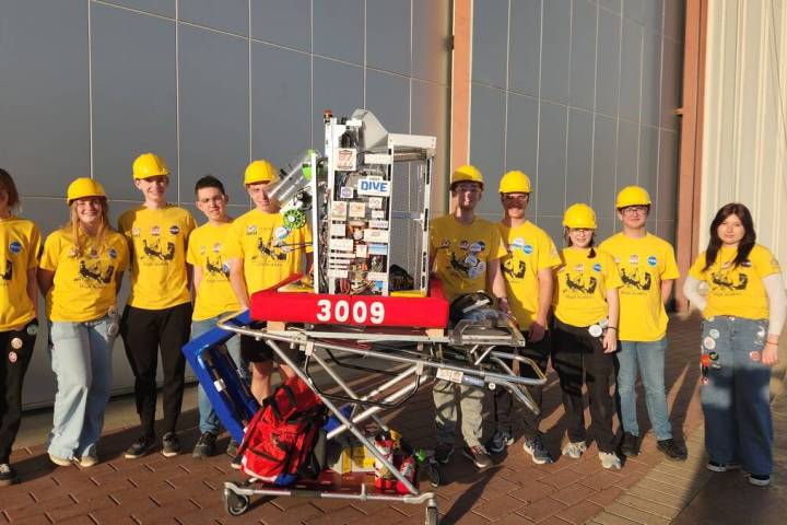 Photos courtesy of Garth Schultz The team shows off this year's robot.