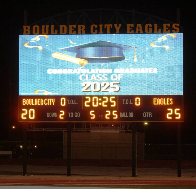 The football field's new scoreboard was able to show a live feed of the ceremony along with eac ...