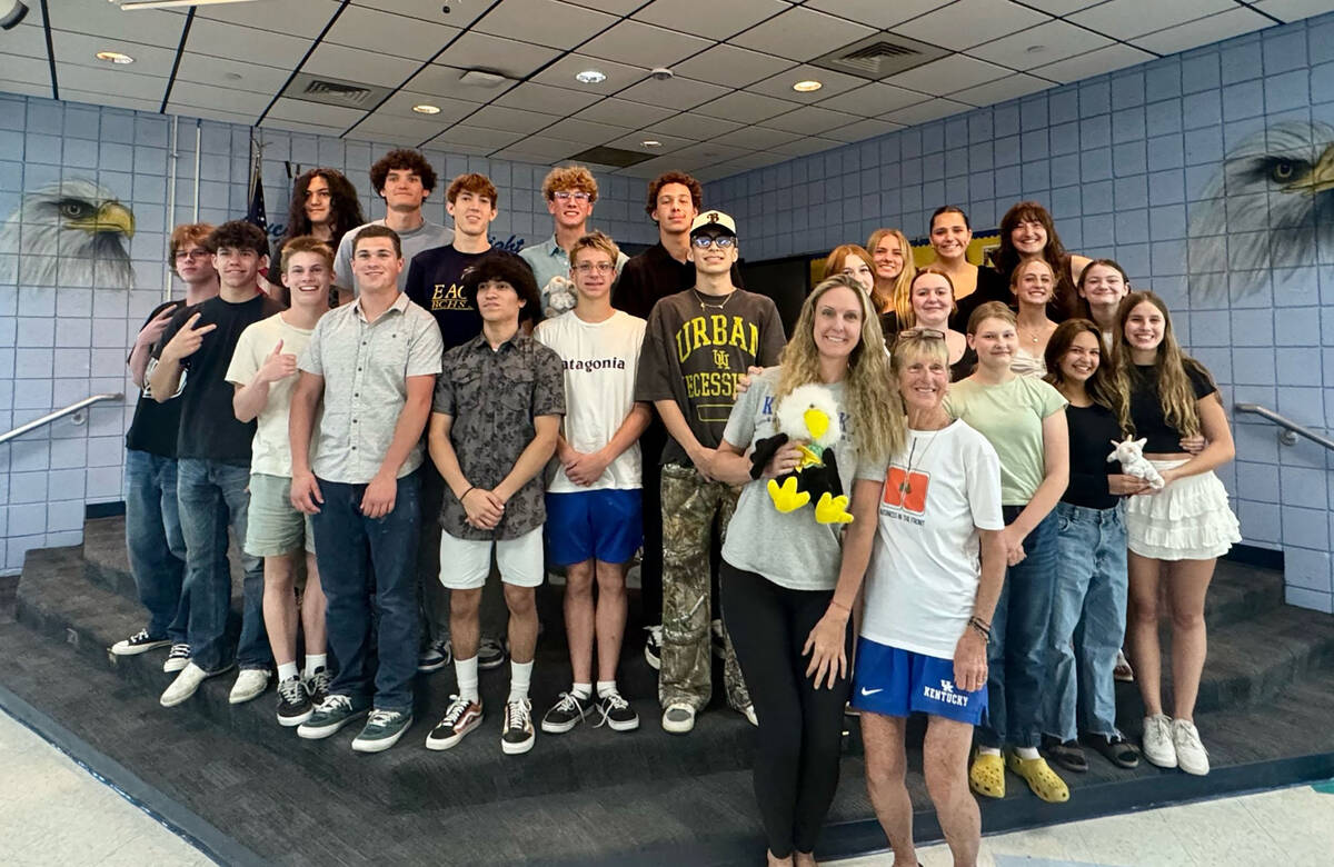 Boys and girls swim team members during their recent team banquet.