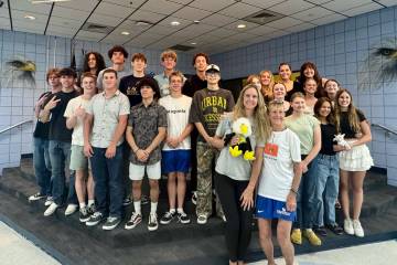 Boys and girls swim team members during their recent team banquet.