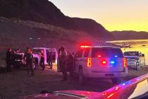Photo courtesy LMNRA Rescuers gather last week as they search for a man and his dog. The man we ...