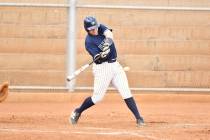 Robert Vendettoli/Boulder City Review Gauge Rhodes drives the ball up the middle for a base hit ...
