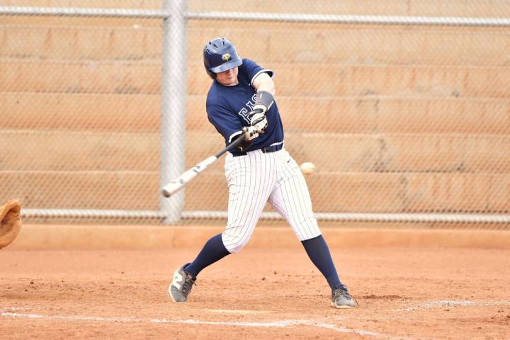 Robert Vendettoli/Boulder City Review Gauge Rhodes drives the ball up the middle for a base hit ...