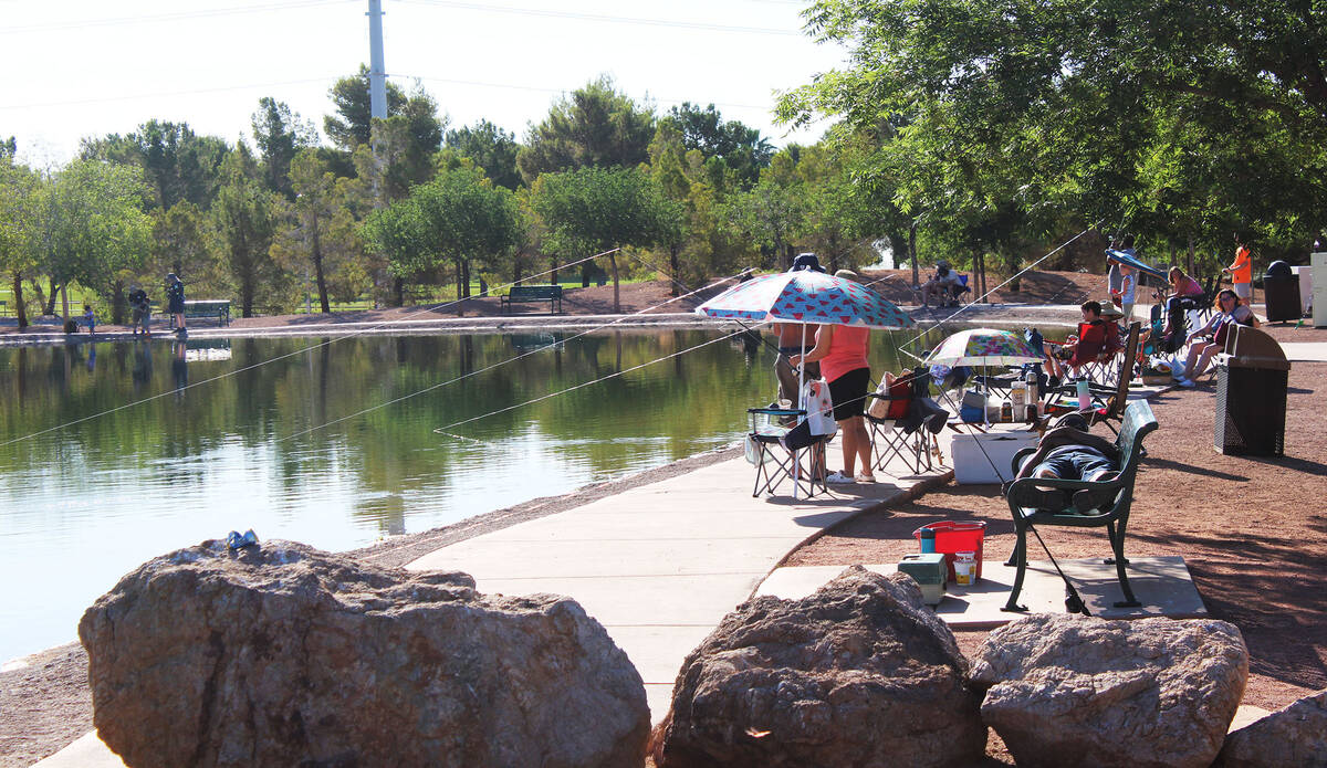 Many of the anglers had their lines in the water while they sat back in the shade. It was nearl ...