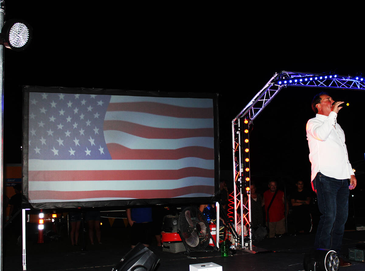 Todd Wolter helped kick off the fireworks show with the singing of "God Bless the USA." He was ...