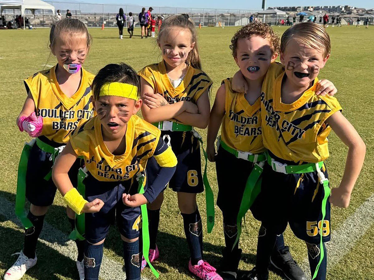 The 6U girls flag team (ages 4-6 years) celebrates after a hard -fought victory earlier this su ...