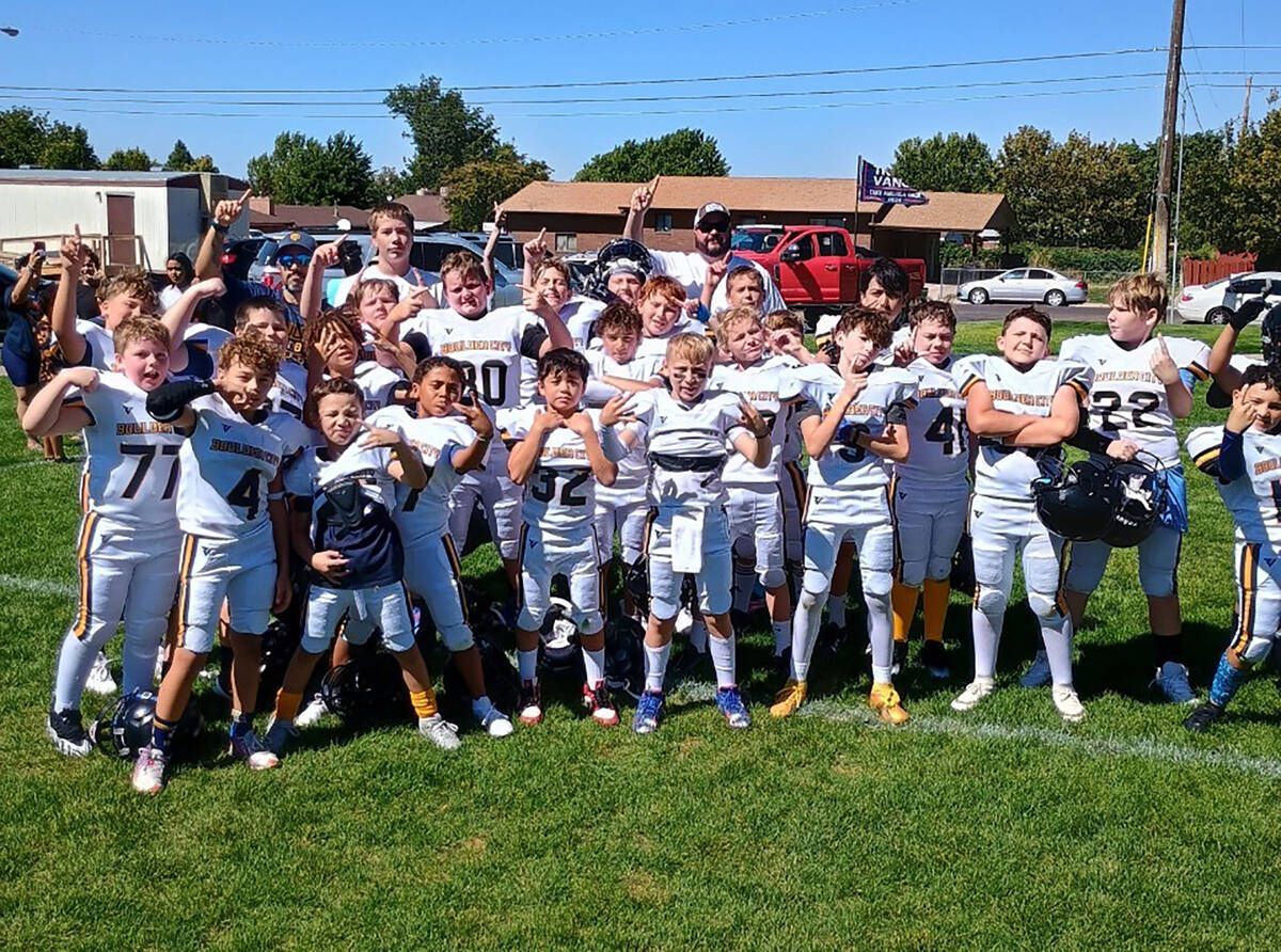 The BC Bears sixth grade team celebrates an undefeated regular season.