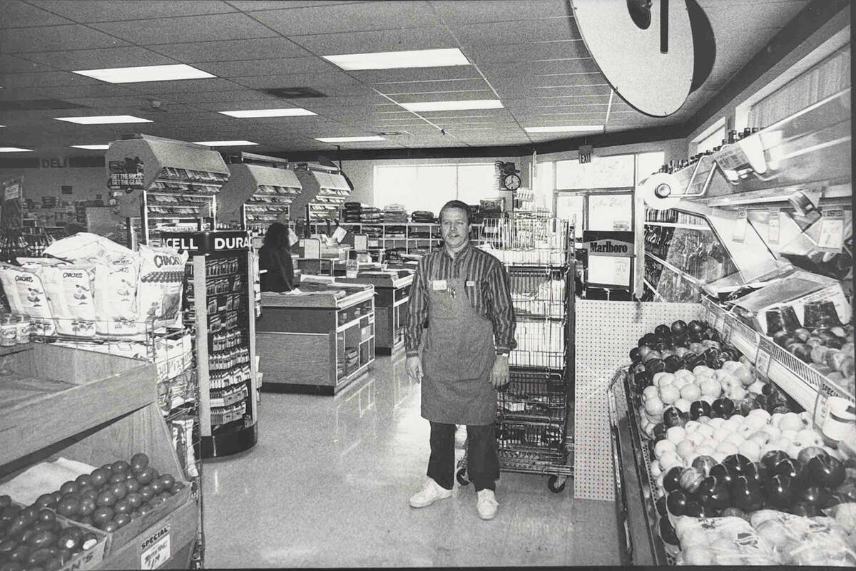 Photo courtesy Boulder Cit/Hoover Dam Museum A Central Market employee stands in the produce se ...