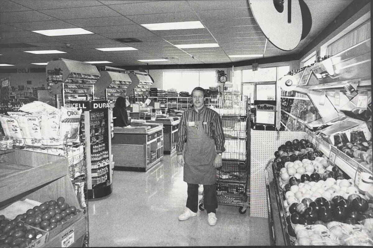 Photo courtesy Boulder Cit/Hoover Dam Museum A Central Market employee stands in the produce se ...