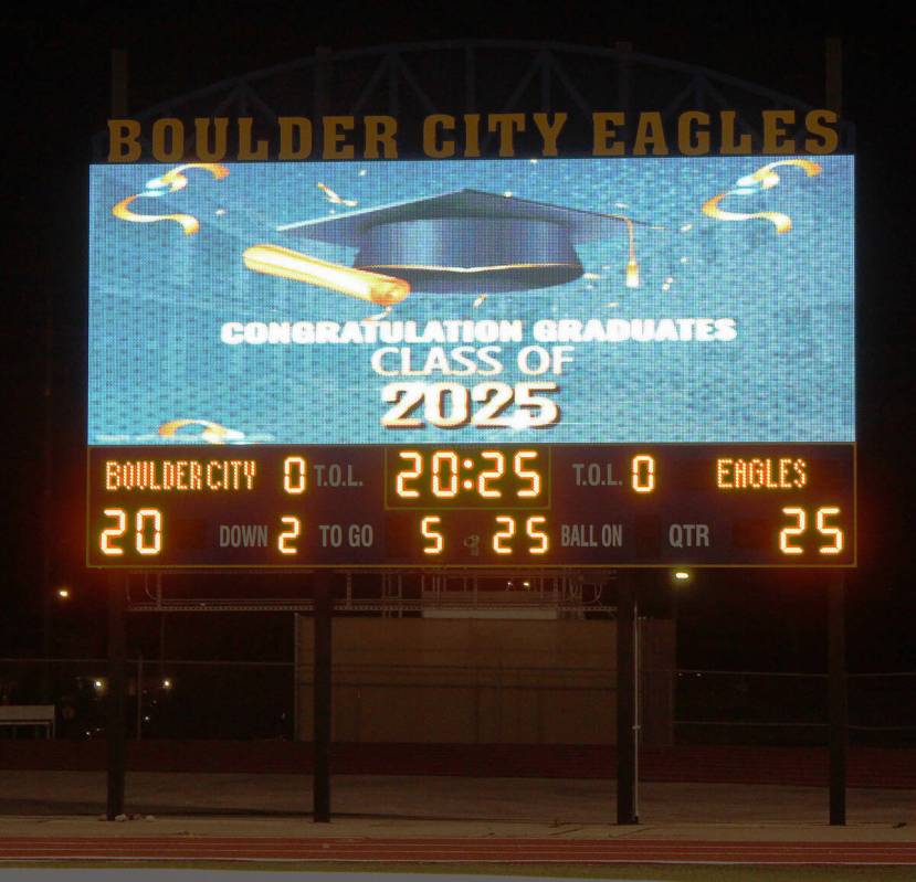 The football field's new scoreboard was able to show a live feed of the ceremony along with eac ...