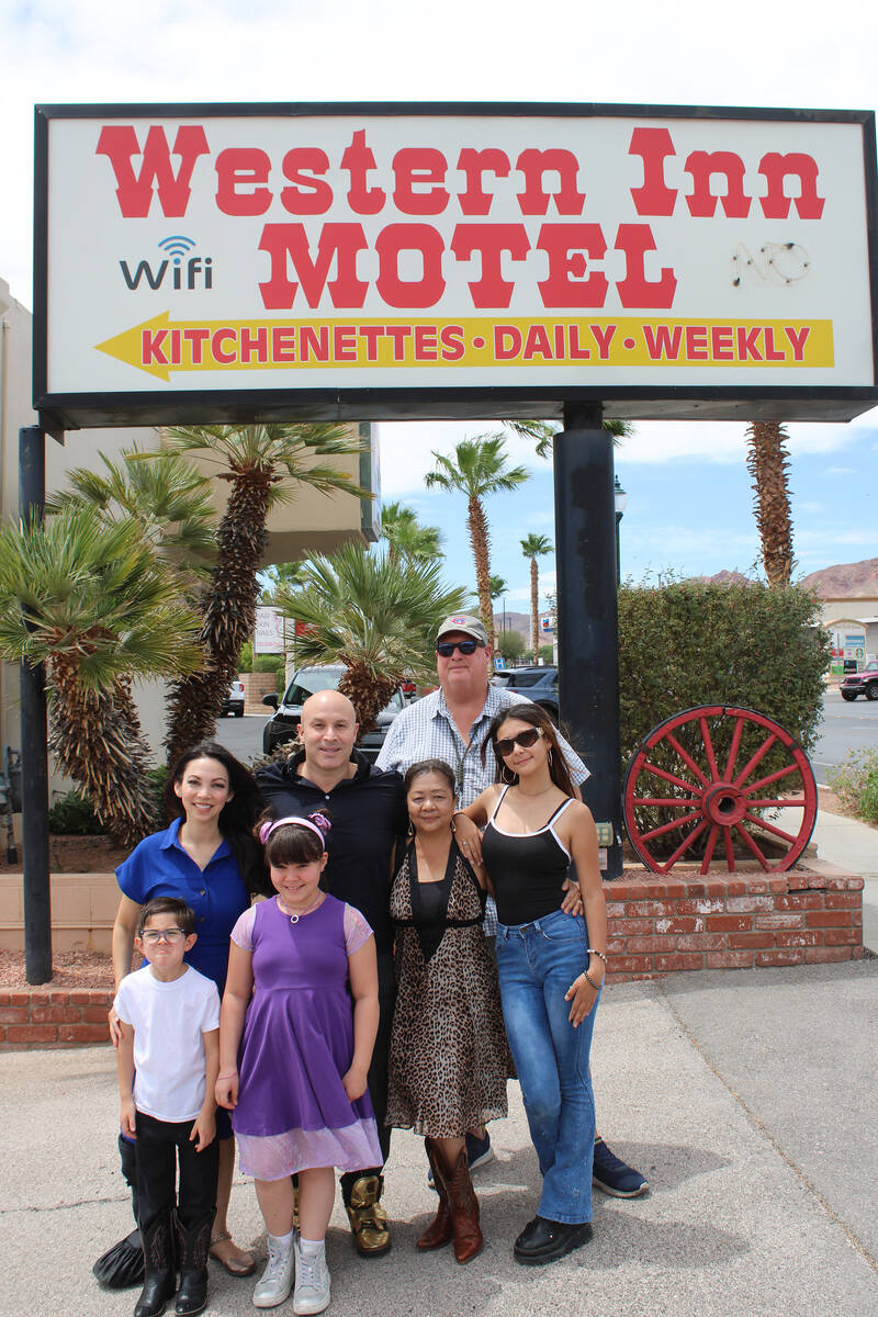Ron Eland/Boulder City Review Seth and Tammy Grabel (in black and blue) and their kids, Grace a ...