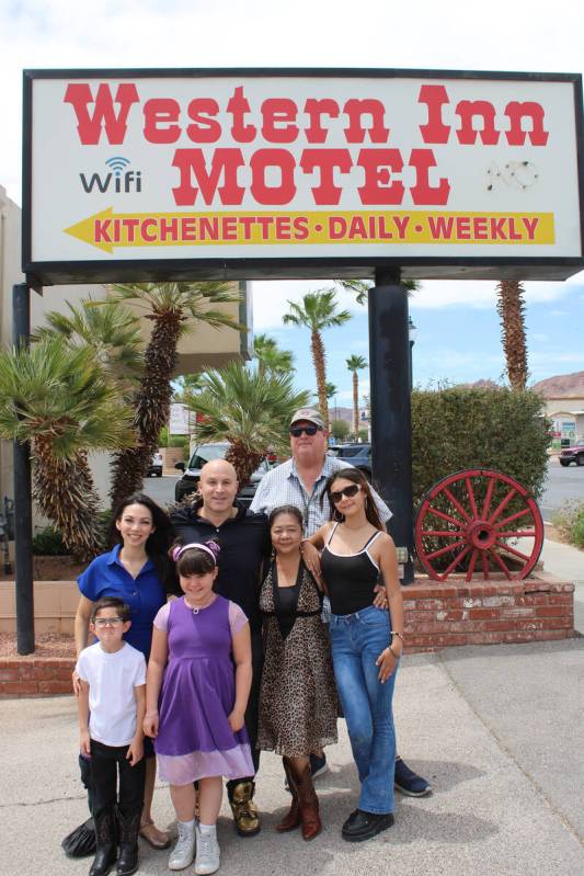Ron Eland/Boulder City Review Seth and Tammy Grabel (in black and blue) and their kids, Grace a ...