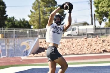 Robert Vendettoli/Boulder City Review Boulder City junior receiver Gavin Robinson hauls in a pa ...