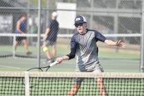 Robert Vendettoli/Boulder City Review Logan Borg returns the ball against Basic last season in ...