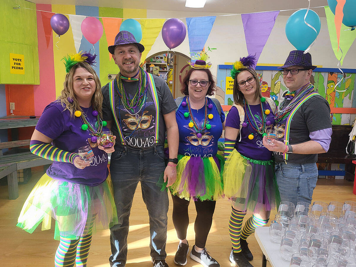 Participants enjoy Mardi Gras night in 2023.