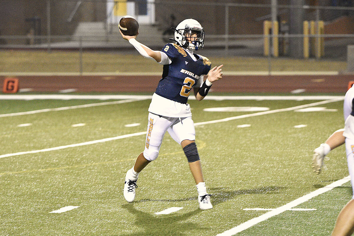 Robert Vendettoli/Boulder City Review Moving the ball downfield, quarterback Asa Mariani connec ...