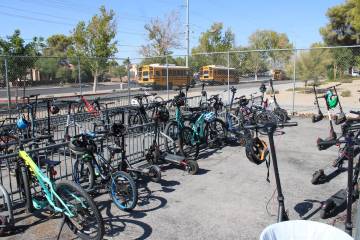 Ron Eland/Boulder City Review E-bikes and scooters parked at Garrett Junior High School.