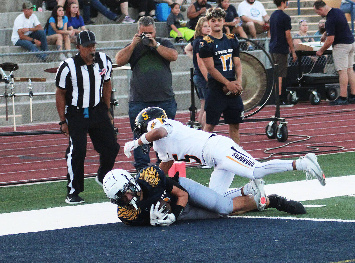 Ron Eland/Boulder City Review Boulder City's Brandon Hobbs hauls in a successful two-point conv ...