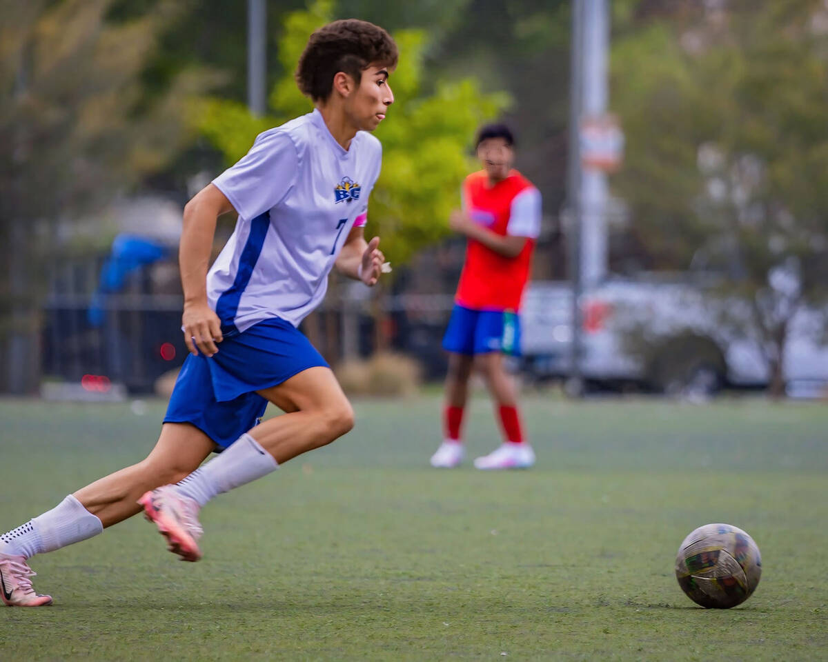 Photo courtesy Catherine Goode Ayden Villa pushes the ball up field against Equipo Academy on S ...