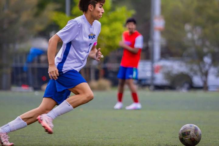 Photo courtesy Catherine Goode Ayden Villa pushes the ball up field against Equipo Academy on S ...