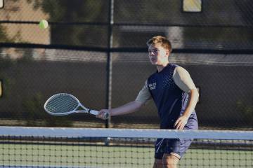 Robert Vendettoli/Boulder City Review Singles player Will Teeples returns the ball against Virg ...