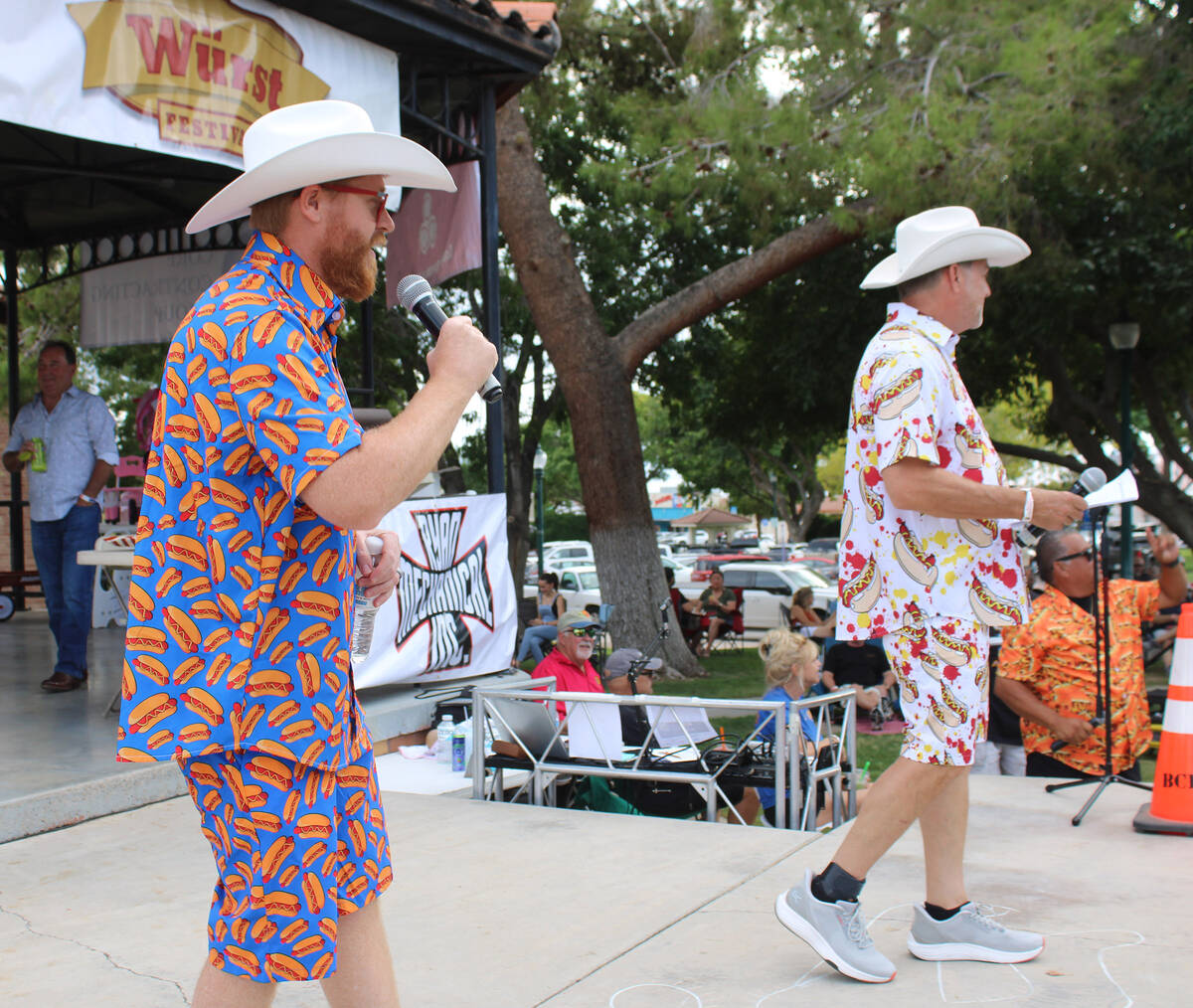 Boulder City Sunrise Rotary members Joe Stubitz and Eric Estes, along with emcee Mike Pacini (f ...