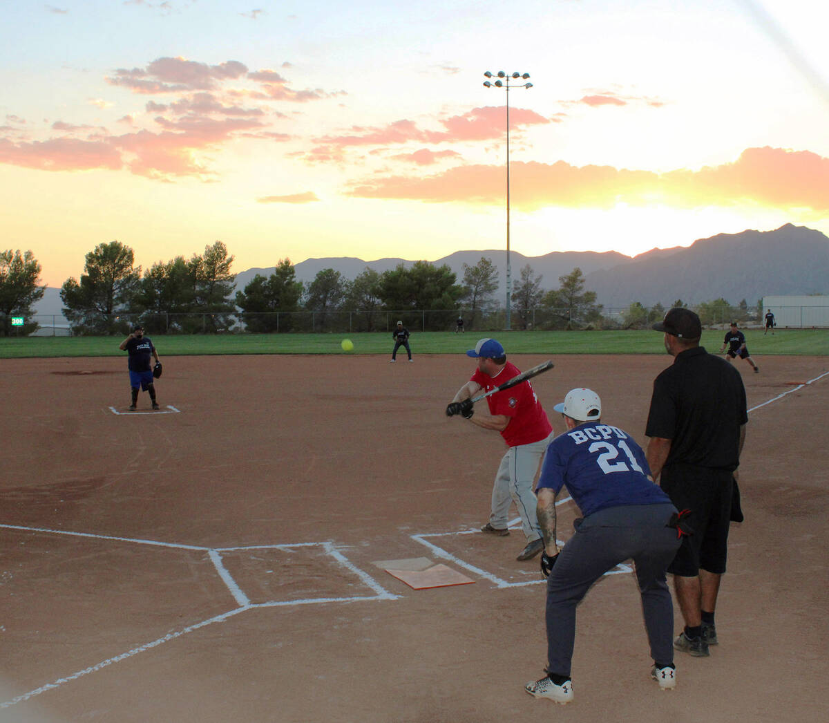 Ron Eland/Boulder City Review file photos The annual National Night Out softball game pitting B ...