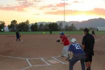 Ron Eland/Boulder City Review file photos The annual National Night Out softball game pitting B ...
