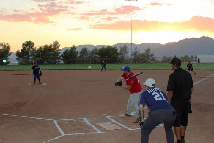Ron Eland/Boulder City Review file photos The annual National Night Out softball game pitting B ...
