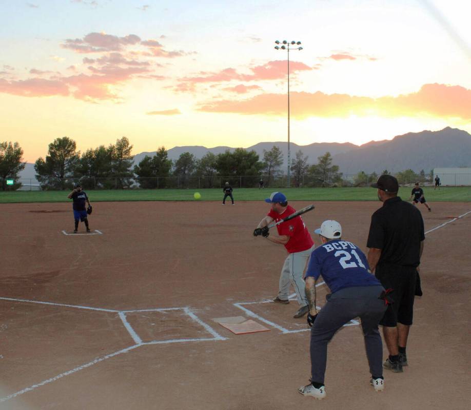 Ron Eland/Boulder City Review file photos The annual National Night Out softball game pitting B ...
