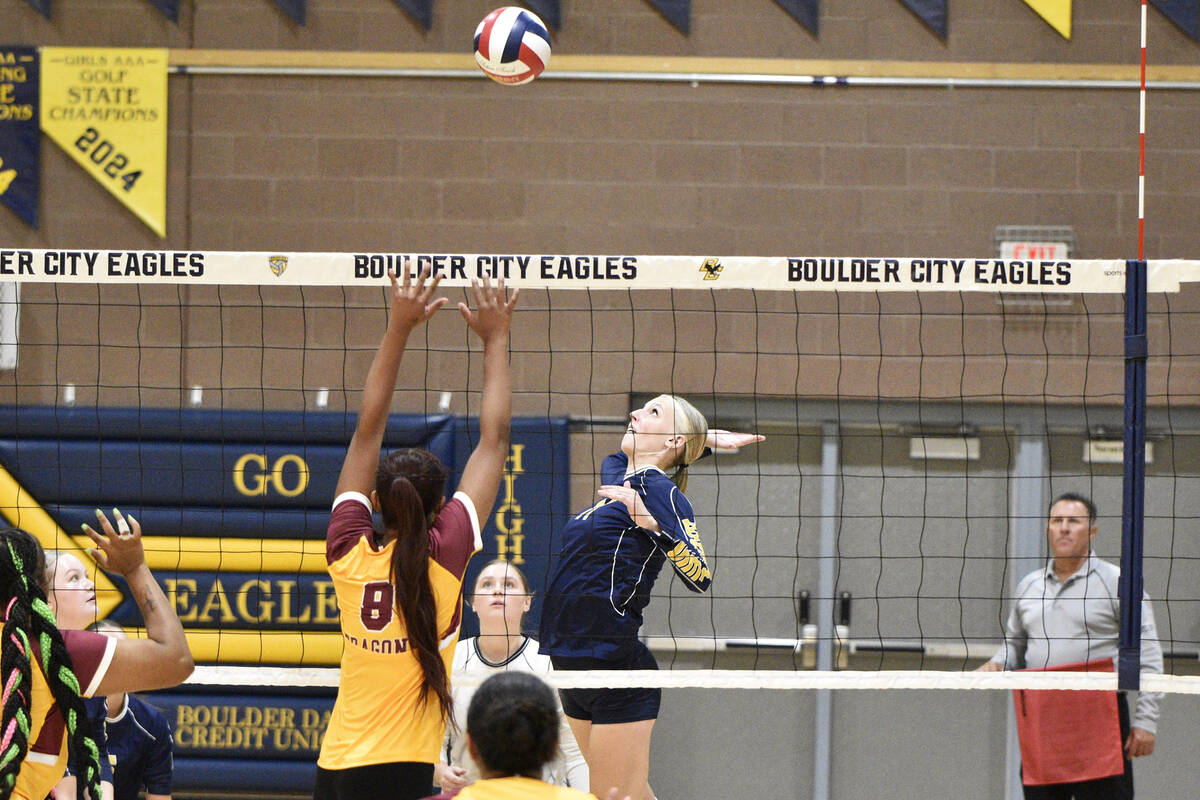 Robert Vendettoli/Boulder City Review Hitting with accuracy, Ivy Dineen spikes the ball against ...