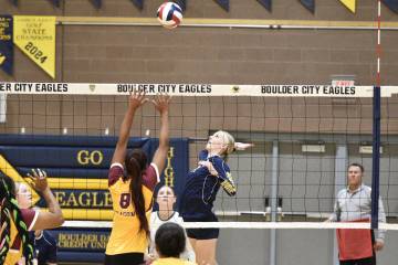 Robert Vendettoli/Boulder City Review Hitting with accuracy, Ivy Dineen spikes the ball against ...