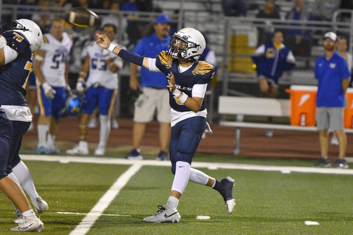Robert Vendettoli/Boulder City Review Eagles quarterback Asa Mariani looks to make a throw down ...