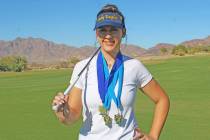 Ron Eland/Boulder City Review BCHS golfer Emmerson Hinds displays her three individual state me ...