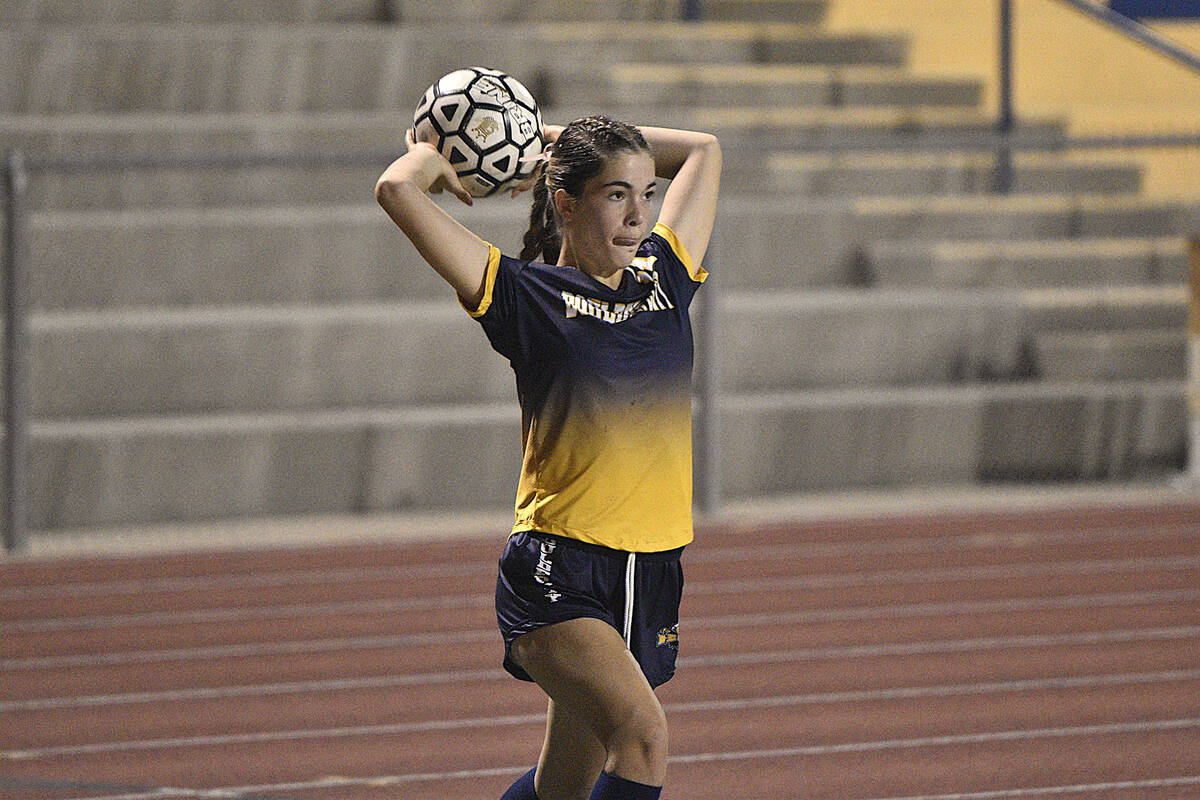 By Robert Vendettoli/Boulder City Review Sylvie Jensen inbounds the ball against The Meadows i ...