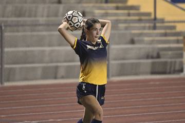 By Robert Vendettoli/Boulder City Review Sylvie Jensen inbounds the ball against The Meadows i ...