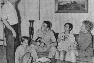 The Las Vegas-Review Journal photo shows Vietnam pilot Richard Gilmore with his parents and sib ...