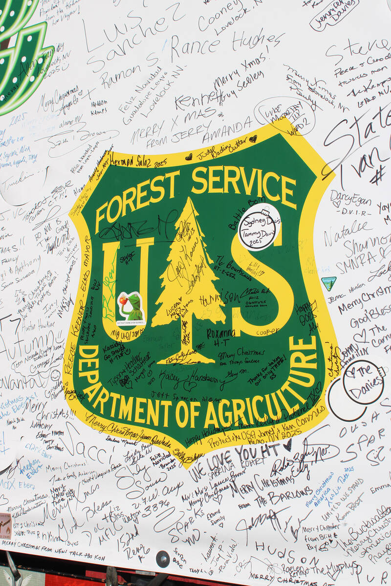 Those coming out to see the tree at each of its stops were encouraged to sign the banners on ea ...