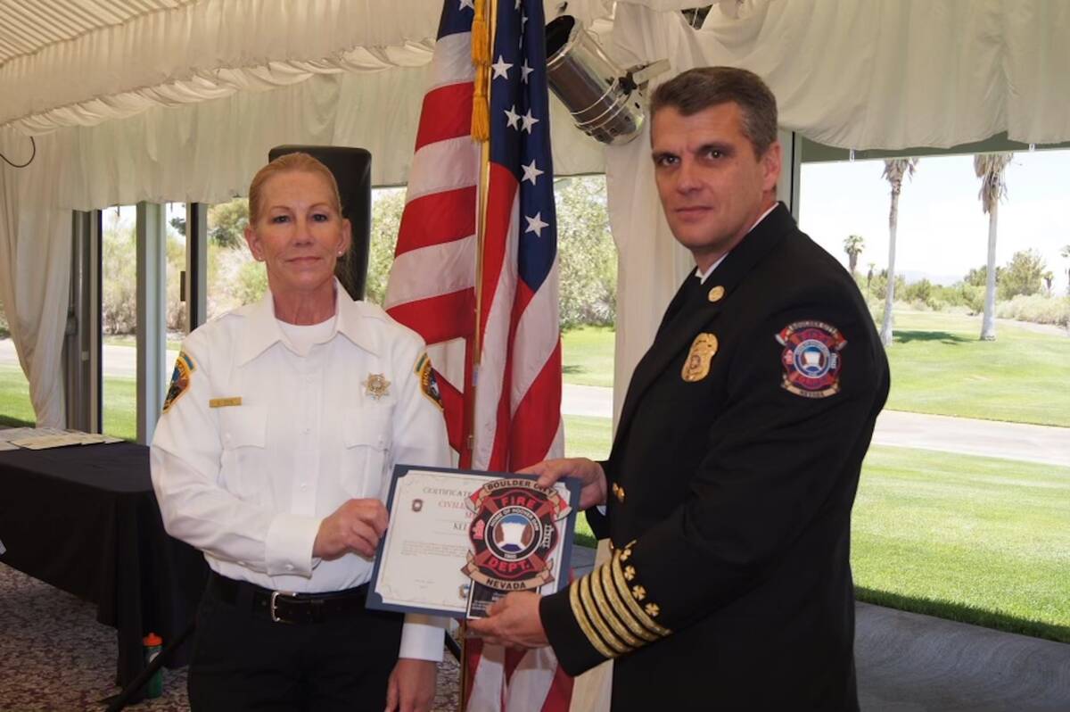 Photo courtesy of Dan Fox Kelly Fox receives volunteer of the year award from former Boulder Ci ...