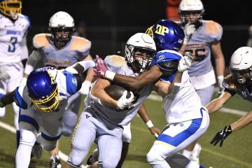 Robert Vendettoli/Boulder City Review Boulder City running back Coen Burrows keeps fighting for ...