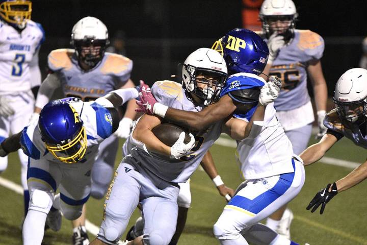 Robert Vendettoli/Boulder City Review Boulder City running back Coen Burrows keeps fighting for ...