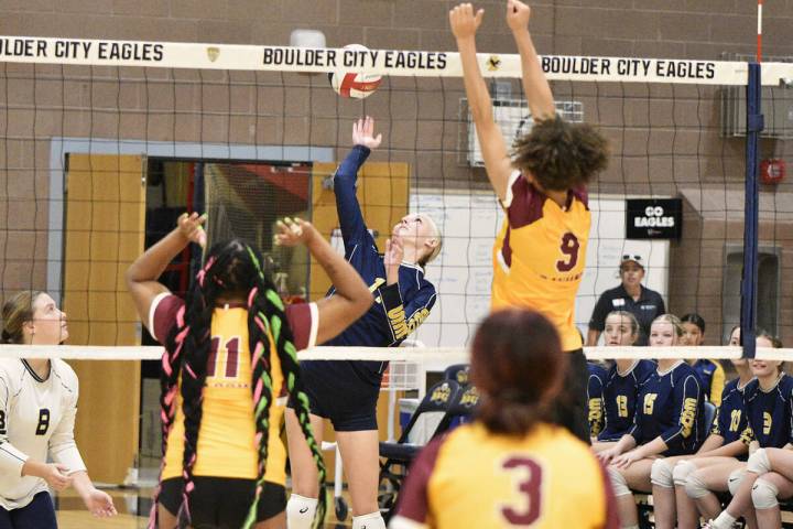 Robert Vendettoli/Boulder City Review Looking for her shot, Ivy Dineen spikes the ball against ...