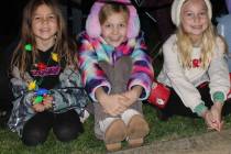 The lighting of the Community Christmas Tree Friday, brought out the smiles of many.