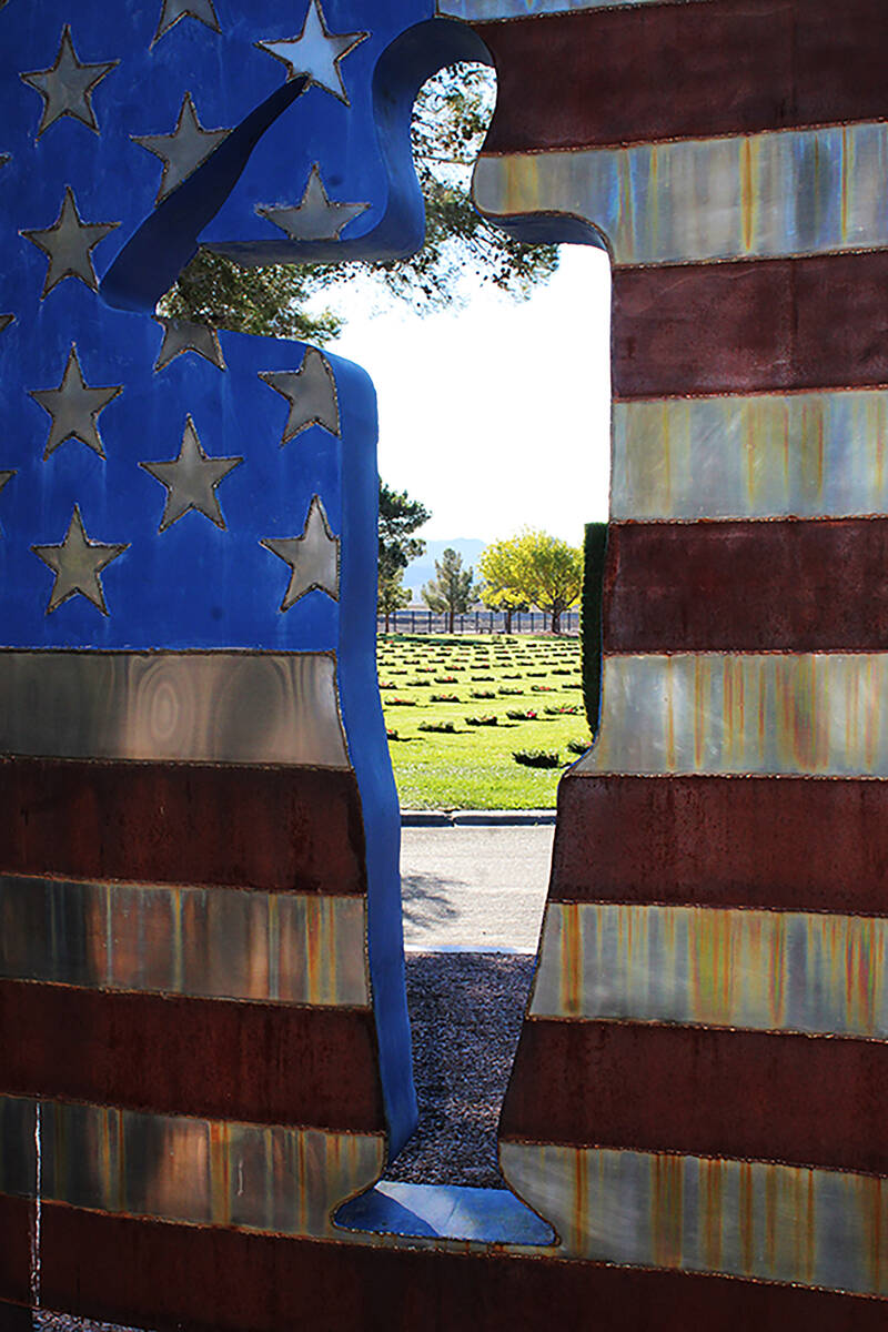 Photos by Ron Eland/Boulder City Review The wreaths can be seen through the metal statue at the ...
