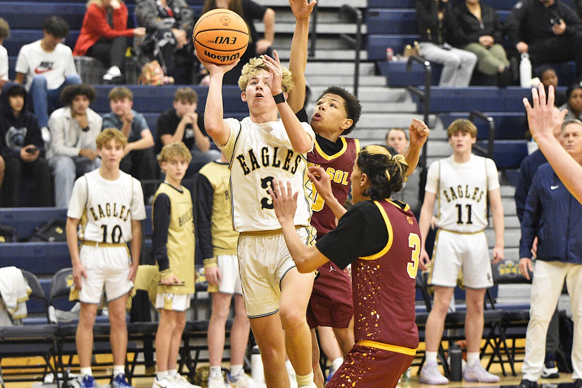 Robert Vendettoli/Boulder City Review Boulder City guard Tyler Bradshaw goes up for a layup aga ...