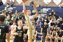 Robert Vendettoli/Boulder City Review Working inside the paint, Boulder City forward Branch Dan ...