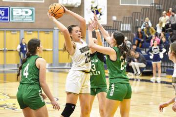 Robert Vendettoli/Boulder City Review Boulder City forward Makenzie Martorano looks to push the ...
