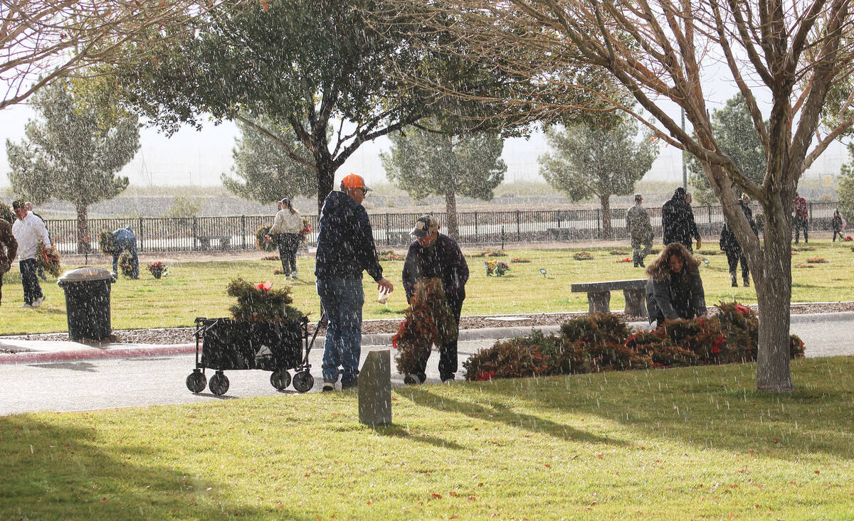 Photos by Ron Eland/Boulder City Review Despite cold temperatures and light rains, dozens of vo ...