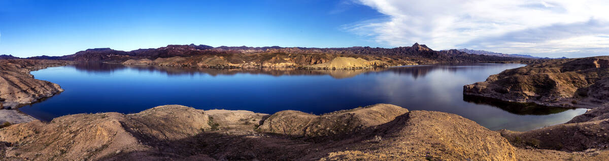 The Colorado River flows near Nelson's Landing in a combined image as the impending deadline fo ...